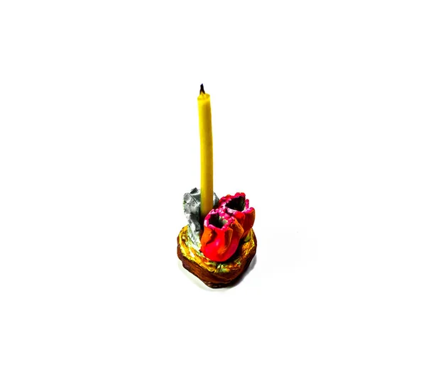 Gyertya Gyertyatartóban Kőből Készült Virágok Formájában — Stock Fotó