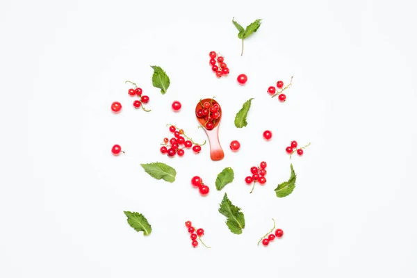 Red currants and soaps on a white background — Stock Photo, Image