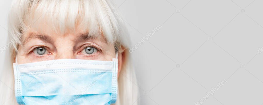 Woman wearing face mask because of Air pollution or virus epidemic