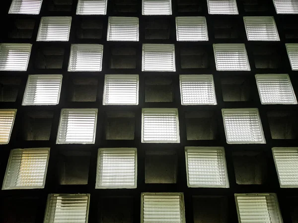 frosted glass and brick wall square shape texture . Abstract background