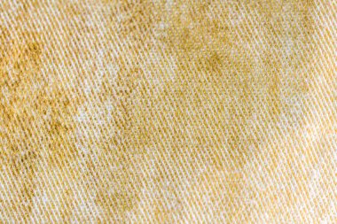 Yakın plan Kirli sarı kumaş dokusu arkaplanı