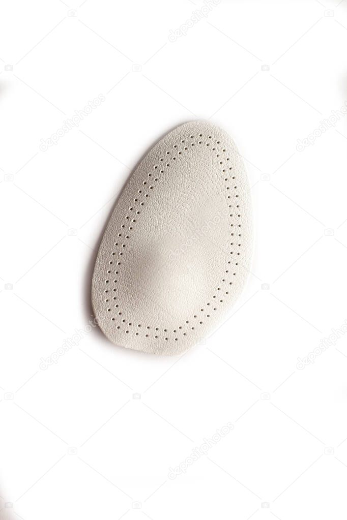Orthopedic silicone heel from corns for the correction of different lengths of legs isolated on white background