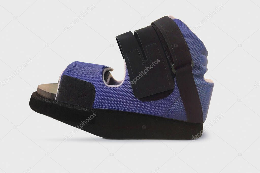 Forefoot Off-loading Shoe after fractures. Detachable therapeutic shoes. Post operative heel shoe on white background. Medical Orthopedic shoes designed specifically for ankle.Trauma and Swelling feet