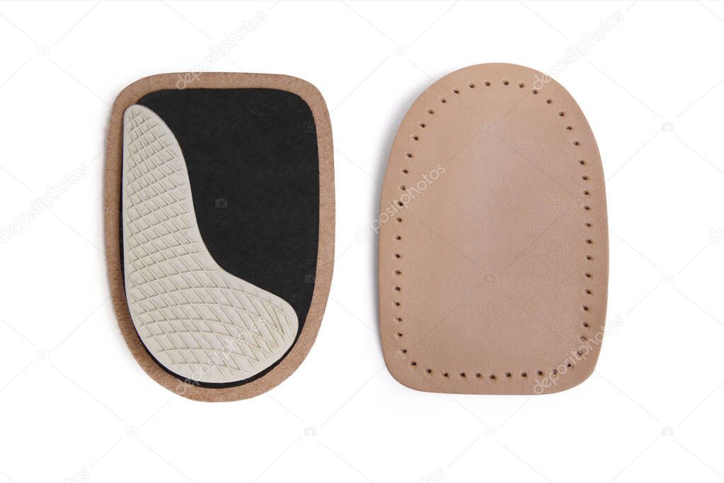 Orthopedic silicone heel pad from corns for the correction of different lengths of legs isolated on white background. Silicone insert for the forefoot. Insole. Silicone thumb protector with interdigital septum prevents friction, calluses, scuffs. 