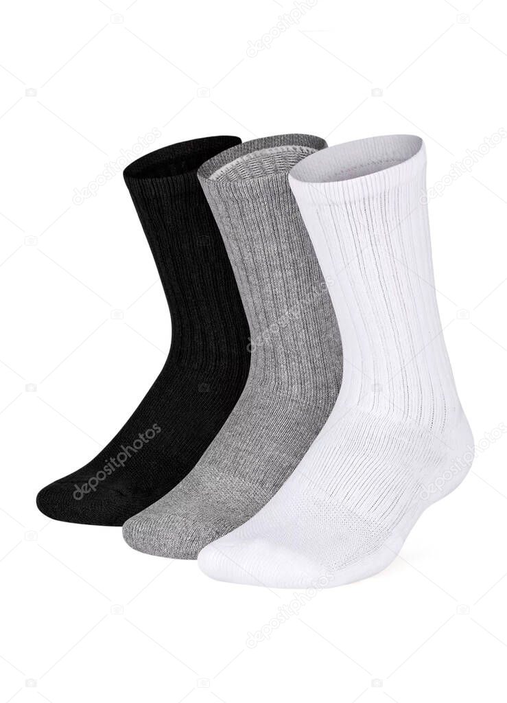 Set of short socks white, grey, black isolated on white background. Three pair of socks in different colors. Sock for sports on invisible foot as mock up for advertising, branding, design.