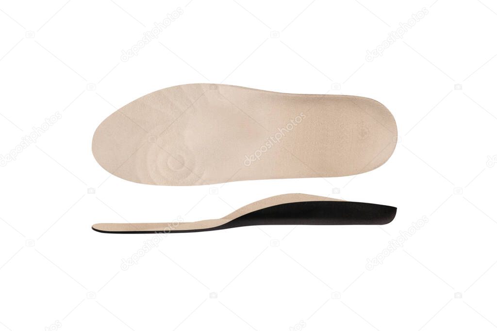 Isolated orthopedic insole on a white background. Treatment and prevention of flat feet and foot diseases. Foot care, comfort for the feet. Wear comfortable shoes. Medical insoles. Flat Feet Correction.