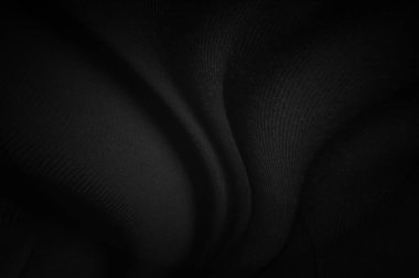 Siyah kumaş çarşaflar arka plan veya doku, dalgalarla soyut, yumuşak odaklı kumaş ipeği siyah
