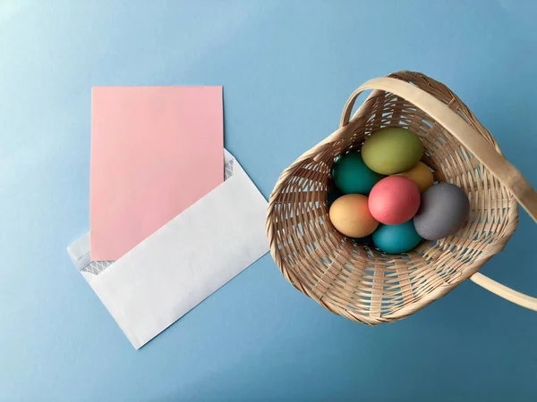 stock image Template greeting card, copy Space for the feast of Easter, eggs colored on a blue background
