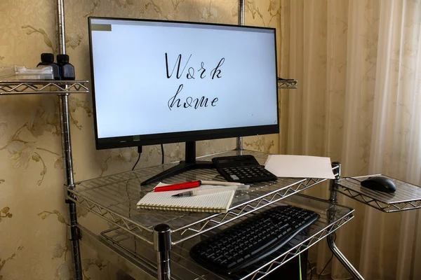 photo of a home workplace with a computer and with text - work at home