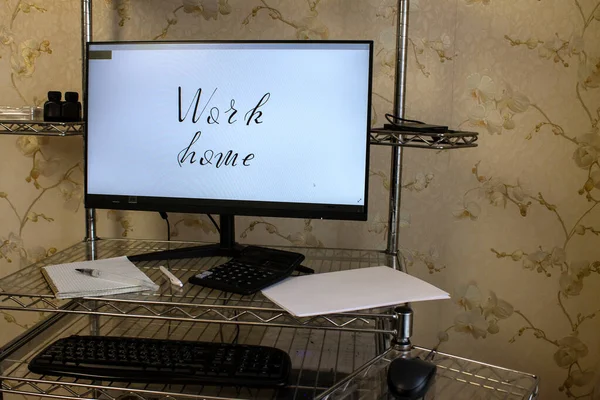 photo of a home workplace with a computer and with text - work at home