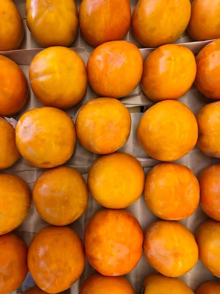 Lot Persimmons Counter Supermarket — Stock Photo, Image
