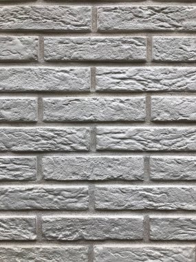 Arka plan, eski bir tuğla gri-kahverengi rengin dokusu. Duvarlar için kullanılır.