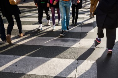 crowd of people crossing a street clipart