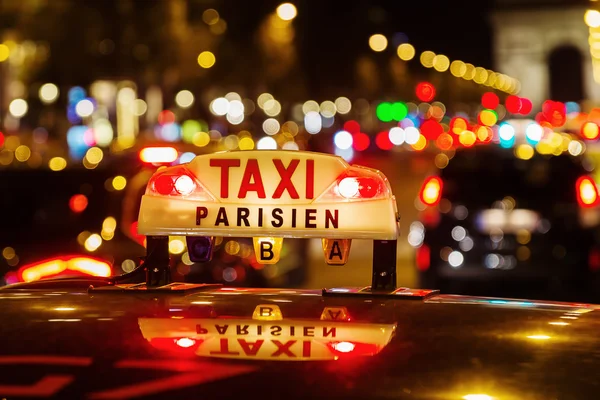 Sinal de néon de um táxi parisiense — Fotografia de Stock