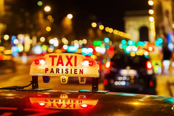 Neon sign of a Parisian taxi — Stock Photo, Image