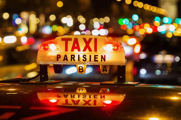 Neon sign of a Parisian taxi — Stock Photo, Image