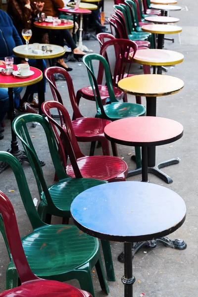 Colorful tables of a street cafe in Paris — Stock Photo, Image