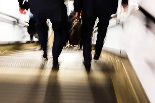 Abstract picture of commuters walking downstairs — Stock Photo, Image