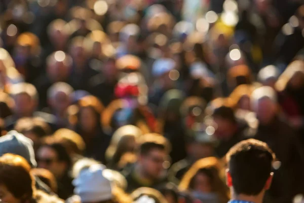 Top view of a crowd of people out of focus — Stock Photo, Image