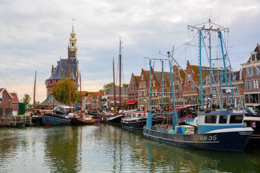 harbour of Hoorn, Netherlands, with sailboats and the Hoofdtoren clipart