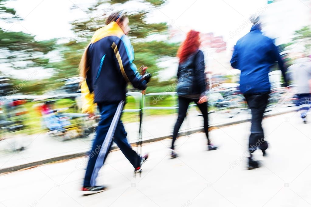 wandering people in motion blur