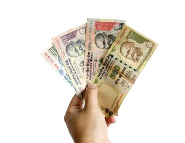 Hindistan Rupisi banknot elinde 