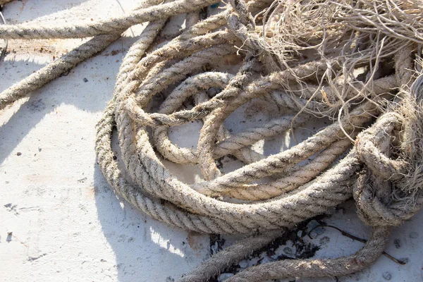 Dirty rope on ground — Stock Photo, Image