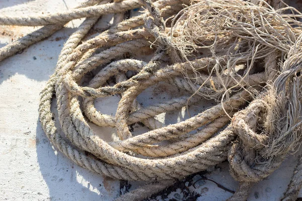 Dirty rope on ground — Stock Photo, Image
