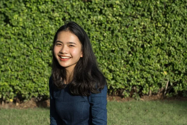 Asian girl cute smile face on green park — Stock Photo, Image