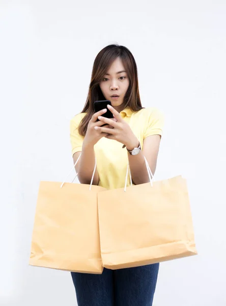 Asian lady hold paper bag shopping — Stock Photo, Image