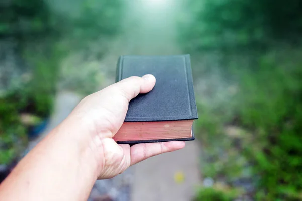 Hand hold minibook bible — Stock Photo, Image