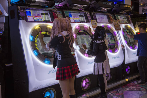 asian cosplay play music game in comic and game activities