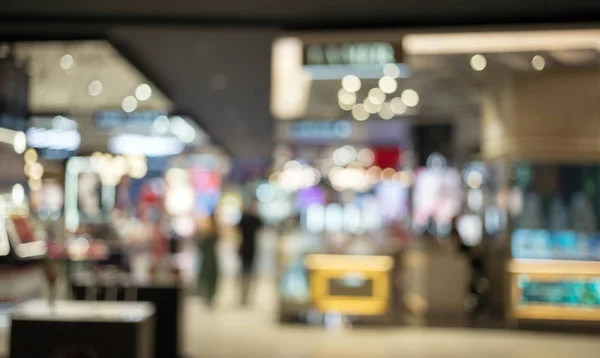 Centro comercial borrão abstrato para o cliente — Fotografia de Stock