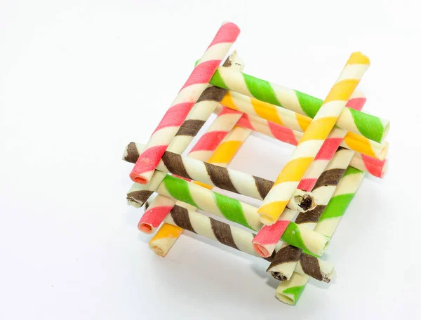 crispy rainbow snack roll with mix flavour on white background