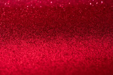 Parıltı, parıltı odaklanmış bulanık kırmızı arkaplan