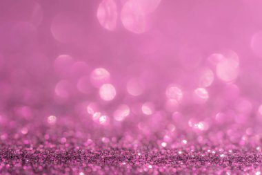 Parıltı, ışıltı odaklanmış bulanık ışık pastel pembe arka plan ve bokeh ışıkları