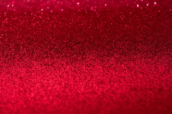 Parıltı, parıltı odaklanmış bulanık kırmızı arkaplan