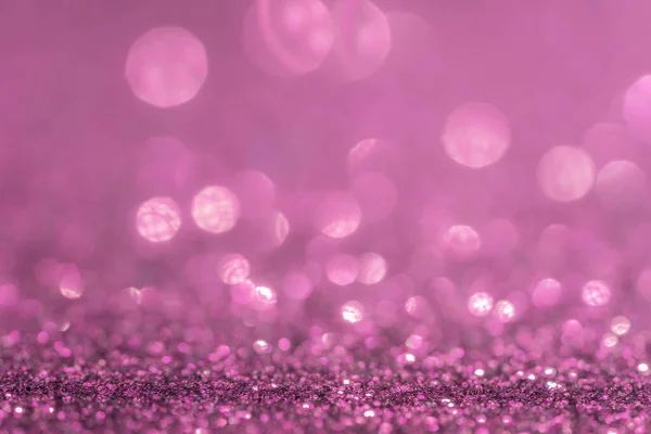 Parıltı, ışıltı odaklanmış bulanık ışık pastel pembe arka plan ve bokeh ışıkları