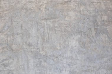 Beton duvar binanın duvarını gösteriyor ve sıvı solüsyonla boyanmış..