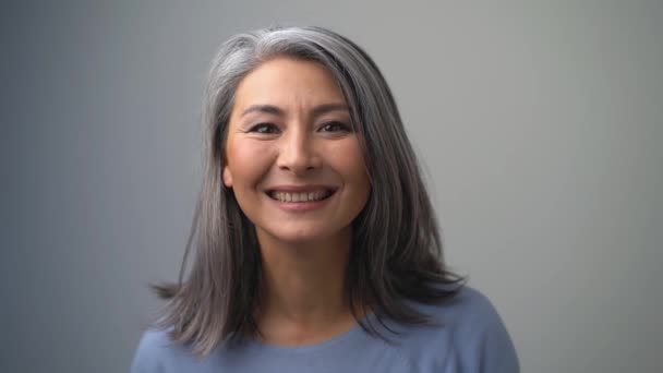 Charming Asian Lady Long Grey Hair Smiling Broadly Looks Straight — Stock Video