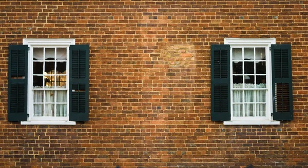 Brick wall with windows for background