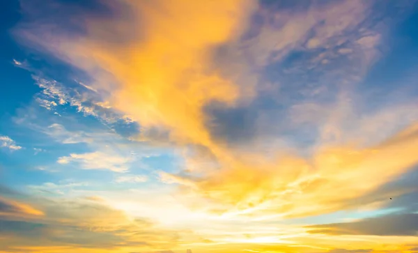 blue sky yellow clouds