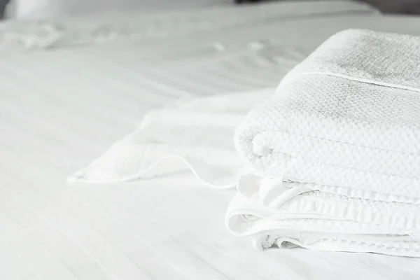 White towel on white mattress fabric, soft light in the morning — Stock Photo, Image