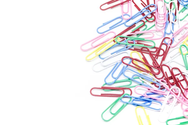 Multi-colored paper clips on white background — Stock Photo, Image