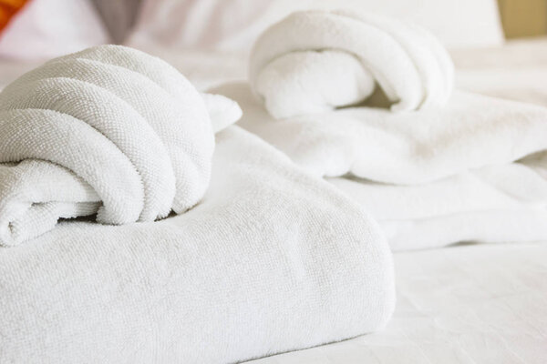 white towel on white mattress fabric, soft light in the morning