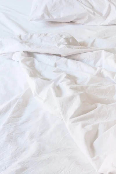 white blanket messy, white bedding sheet messy