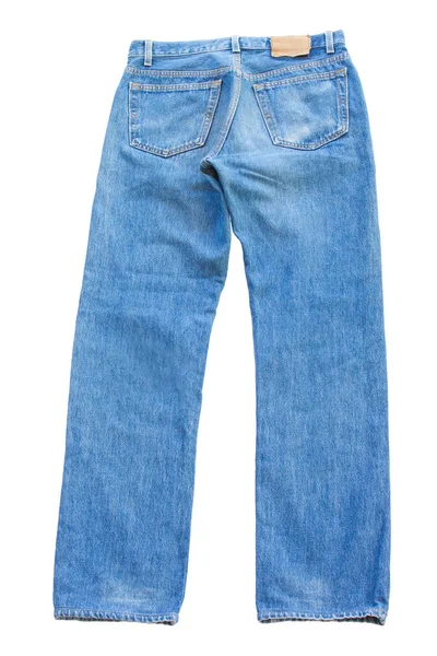 Назад синие джинсы изолированы на белом фоне — стоковое фото