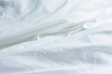 Battaniye dağınık yatak beyaz, uzun bir uyku gece kış Form doku.