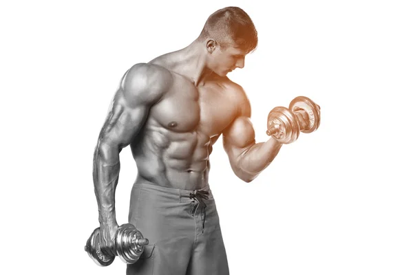 Muscular man working out doing exercises with dumbbells at biceps, strong male abs, isolated over white — Stock Photo, Image