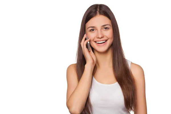 Happy smiling woman talking on mobile phone, isolated on white background. Beautiful girl with a smartphone — Stock Photo, Image
